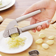Stainless Steel Garlic Press Crusher & Squeezer – Premium Kitchen Accessory | Best Price in Pakistan